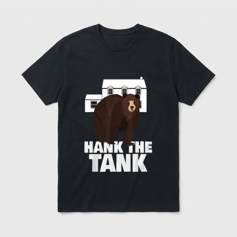 Hank The Tank T-Shirt – Brown bear standing in front of a white house with text Hank The Tank – Classic T-Shirt in Black