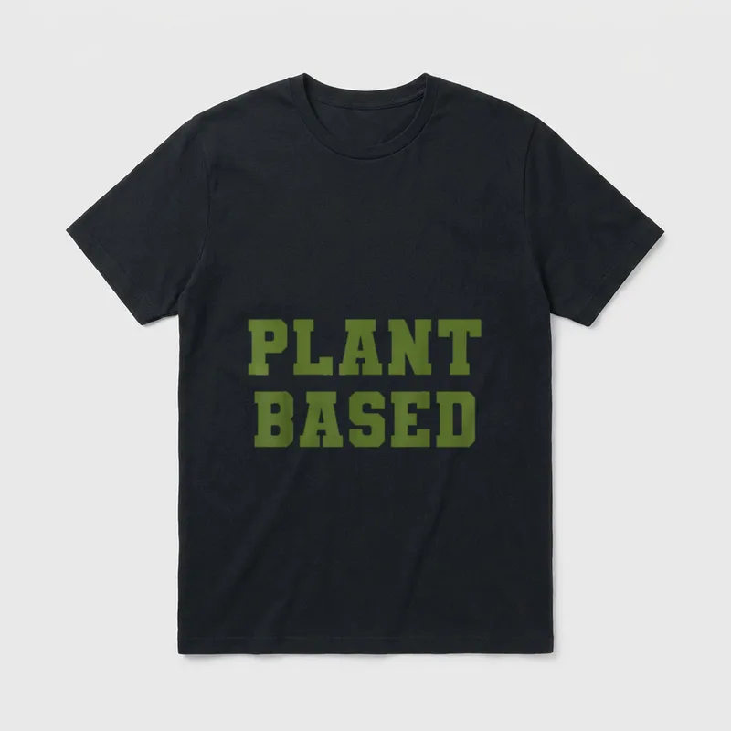 Plant Based Diet Dino T-Shirt – Bold green block letters reading PLANT BASED on a grey background – Classic T-Shirt in Black