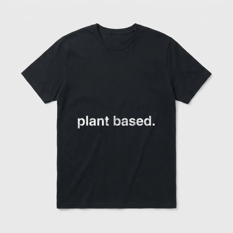 Plant Based For Vegans T-Shirt – White distressed text reading plant based. on a grey background – Classic T-Shirt in Black