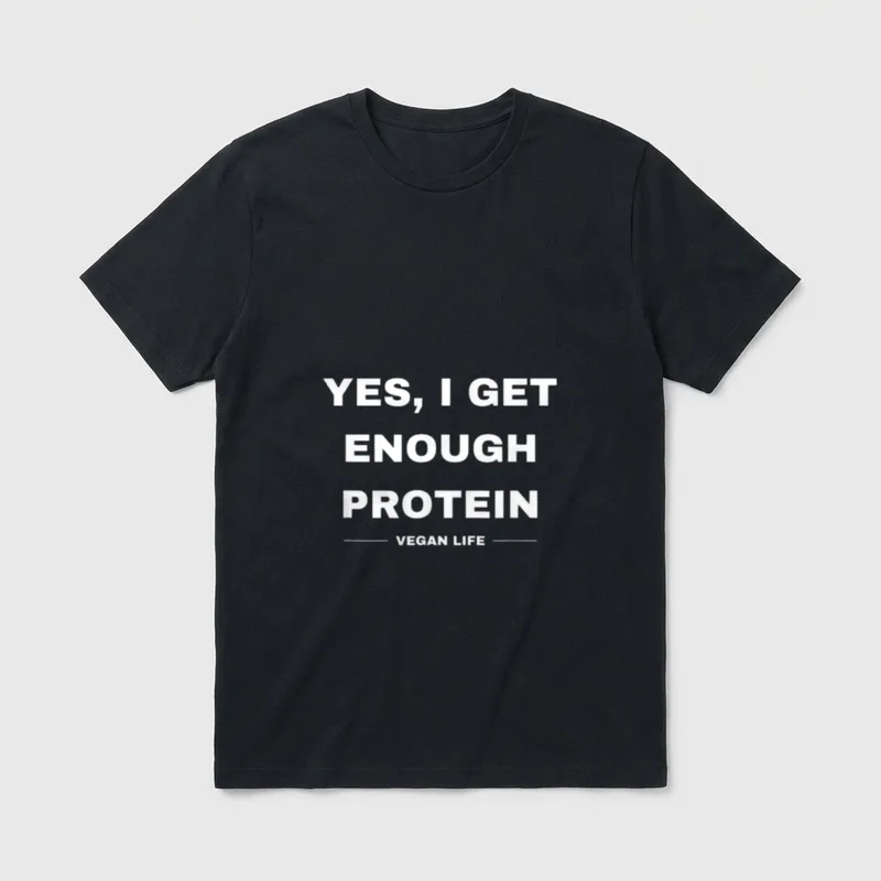 YES I GET T-Shirt – White text reading Yes I Get Enough Protein Vegan Life on grey background – Classic T-Shirt in Black