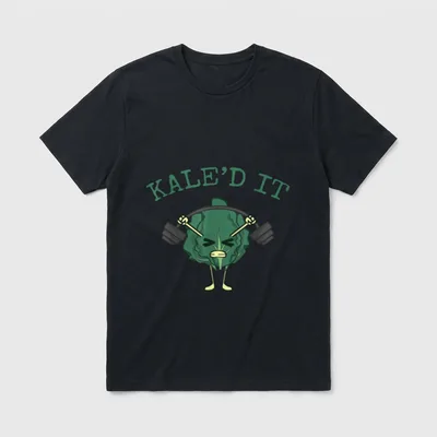 Kale'd It Funny Vegan T-Shirt – A cartoon kale lifting a barbell under the text KALE'D IT – Classic T-Shirt in Black