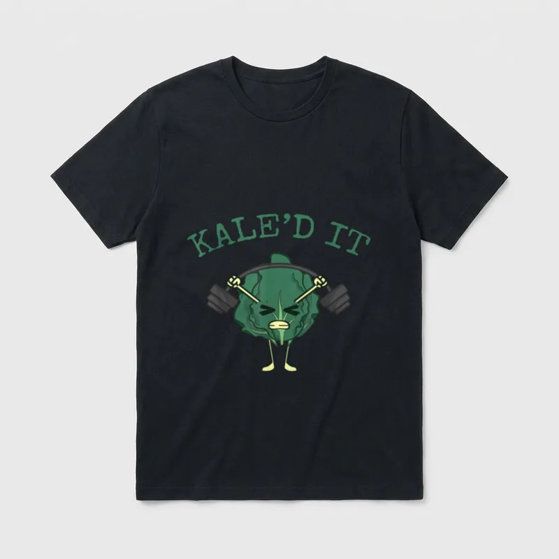 Kale'd It Funny Vegan T-Shirt – A cartoon kale lifting a barbell under the text KALE'D IT – Classic T-Shirt in Black