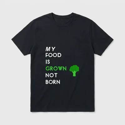 My Food T-Shirt – Text reading MY FOOD IS GROWN NOT BORN beside a green broccoli icon – Classic T-Shirt in Black