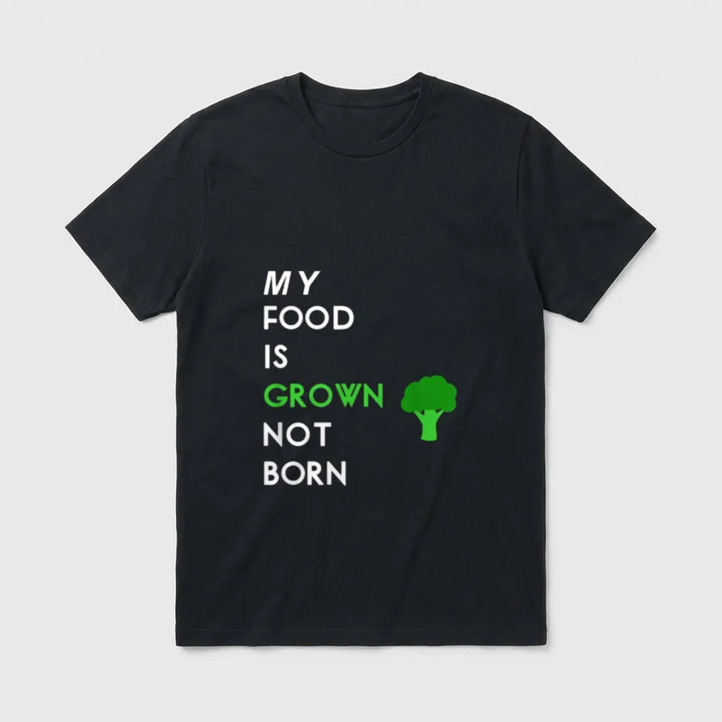 My Food T-Shirt – Text reading MY FOOD IS GROWN NOT BORN beside a green broccoli icon – Classic T-Shirt in Black