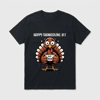 Happy Thanksgiving But Eat T-Shirt – Sweating cartoon turkey holding a sign that says eat tacos – Classic T-Shirt in Black