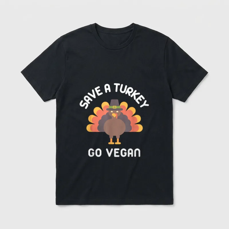 Save A Turkey Go T-Shirt – Cartoon turkey in a pilgrim hat with text Save A Turkey Go Vegan – Classic T-Shirt in Black