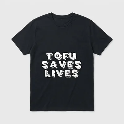 Tofu Saves Lives Vegetarian T-Shirt – Bold 3D text reading TOFU SAVES LIVES in white block letters – Classic T-Shirt in Black