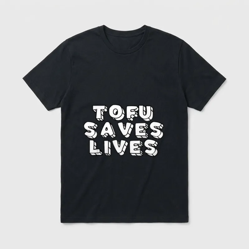 Tofu Saves Lives Vegetarian T-Shirt – Bold 3D text reading TOFU SAVES LIVES in white block letters – Classic T-Shirt in Black