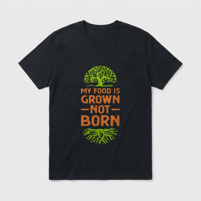 for a Vegan Quote T-Shirt – Green tree graphic with orange text reading My Food Is Grown Not Born – Classic T-Shirt in Black