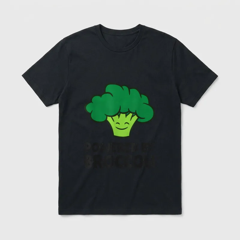 Powered By Broccoli Vegan T-Shirt – Smiling cartoon broccoli head with bold black text below – Classic T-Shirt in Black