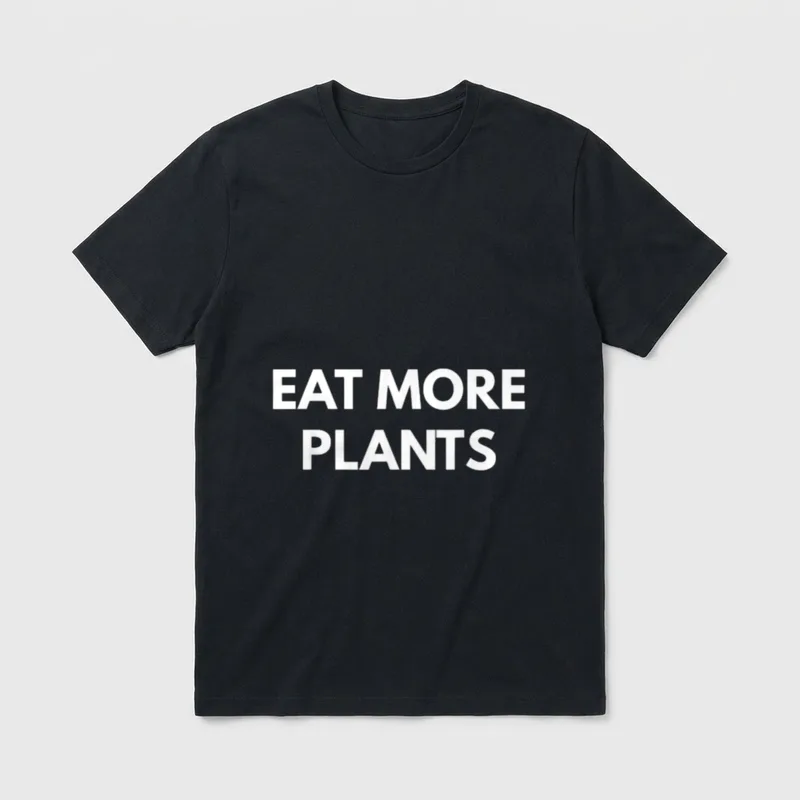 Eat More Plants Vegetarian T-Shirt – Bold white text reading EAT MORE PLANTS on a grey background – Classic T-Shirt in Black